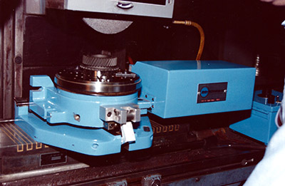 A rotary grinding table attached to a surface grinding machine